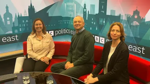 MPs (l-r) Marie Goldman, Jerome Mayhew and Pam Cox discussed solar power on BBC Politics East and are pictures in the BBC studio at The Forum in Norwich.