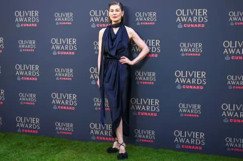 Reuters Rosamund Pike attends the 2026 Olivier Awards at the Royal Albert Hall in London, Britain, April 12, 2026