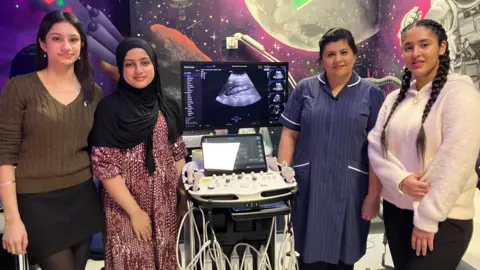 (L-R) Simran, Nimra, with senior paediatric sonographer Sonia Mahay, and Gursharan.