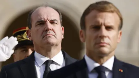 Getty Images French PM Jean Castex, left, and President Emmanuel Macron, right