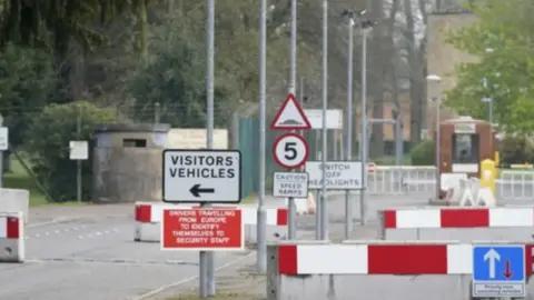 PA Media A picture showing a series of road signs and barriers which used to form the entrance to RAF Linton-on-Ouse