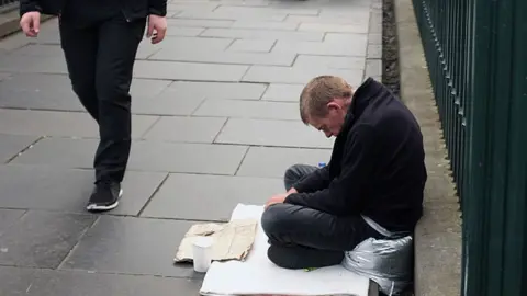 Getty Images Homeless man in Edinburgh