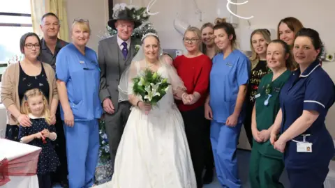 Betsi Cadwaladr Health Board Hospital staff with married couple