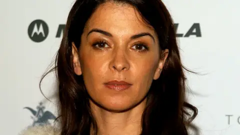 Getty Images Annabella Sciorra pictured at a hip hop event in 2003