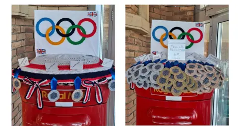 Julie Knowles Post box topper showing the Olympic rings in wool and gold, silver and bronze medals clustered beneath. The picture on the left shows four, while the one on the right shows 65