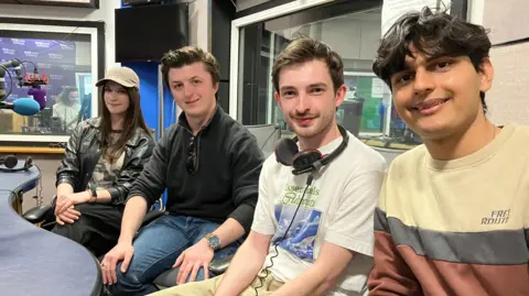 Jon Wright/BBC Four people sat in the radio studio