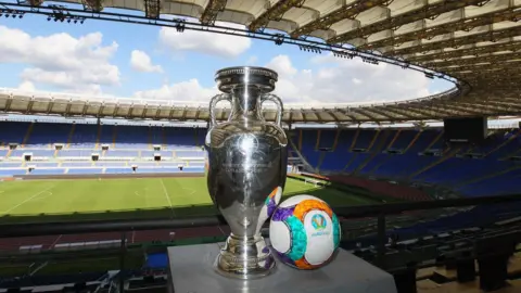 Getty Images The UEFA Euro trophy in the Stadio Olimpico in Rome