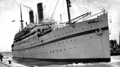 PA Media A shot of the ship HMT Empire Windrush