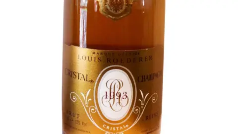 Wilsons Auctions A bottle of champagne