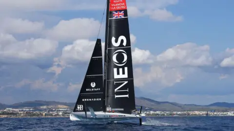 Getty Images Ben Ainslie of Great Britain, Giles Scott of Great Britain, Leigh McMillan of Great Britain, Bleddyn Mon of Great Britain and INEOS Britannia in action during the 37th America's Cup Preliminary Regattas on September 14, 2023. 