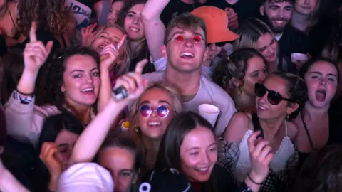 Getty Images Fans at Sefton Park gig in Liverpool