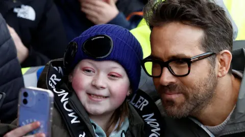 Ryan Reynolds with a fan