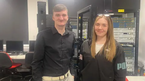 BBC Students Denisa and Fraser pictured in the data department of the University of Gloucestershire