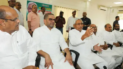 Getty Images Bihar Chief Minister Nitish Kumar with Prashant Kishore, K C Tyagi and others at the National Executive meeting of the Janta Dal United, on June 9, 2019 in Patna, India.