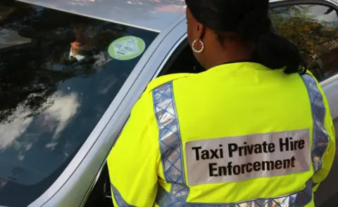 TfL Taxi compliance officer and driver