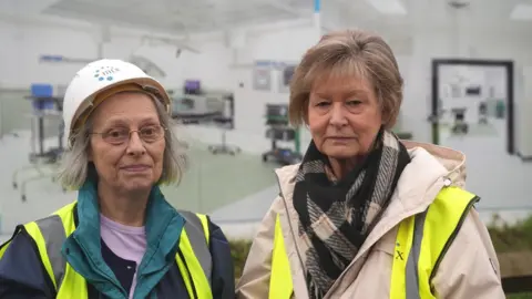 John Fairhall/BBC Patient representatives Linda and Sue outside the new surgical centre in Colchester