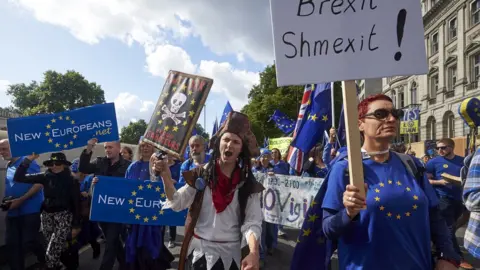 Getty Images Pro-EU demonstrators march through central London during the People's March for Europe against Brexit on September 9, 2017. Thousands joined the pro-EU march calling on politicians to 'unite, rethink and reject Brexit'.