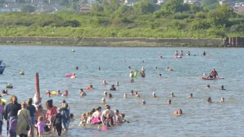 Andy Shawcross swimmers in the water