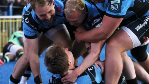 Cardiff players celebrate after winning 11 league games this season