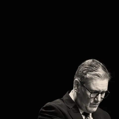 BBC Starmer looking sad on a black background