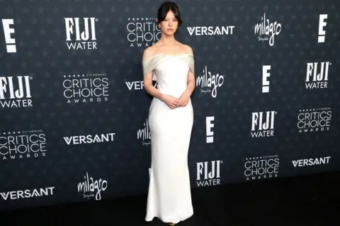 Getty Images Mia Goth attends FIJI Water At The 31st Annual Critics Choice Awards at Barker Hangar on January 04, 2026 in Santa Monica, California.