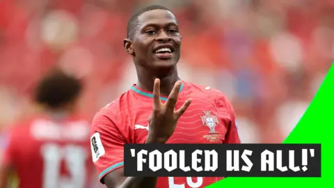Nuno Mendes celebrates a goal for Portugal with a hand sign in the 2026 World Cup