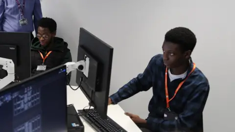 Telford College Two students at computers at the new college