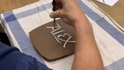 Manchester University NHS Foundation Trust Plaque showing Alex's name