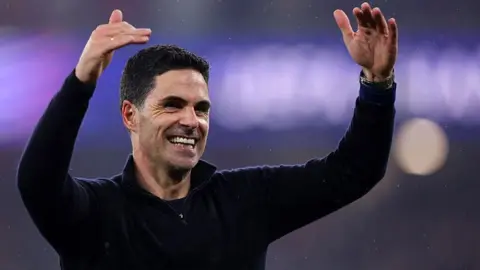 Arsenal boss Mikel Arteta celebrates after his side's win over Atletico Madrid in the Champions League 