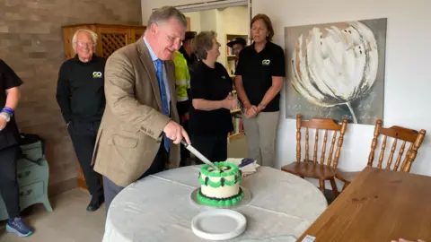 BBC Close up of the lieutenant governor at the ceremony