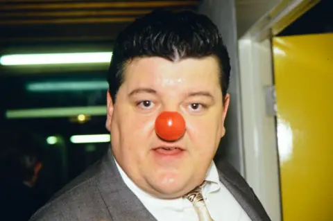 Comic Relief Robbie Coltrane with a red nose