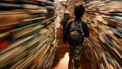 Getty Images Boys in books maze