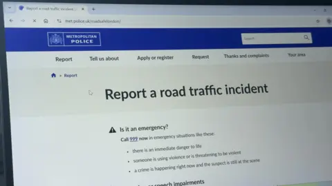 BBC / Harry Craig A computer screen displaying the Metropolitan Police's website, on a page with the heading 'Report a road traffic incident'.