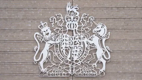 PA Media Sign for Cambridge Crown Court on the side of the building 