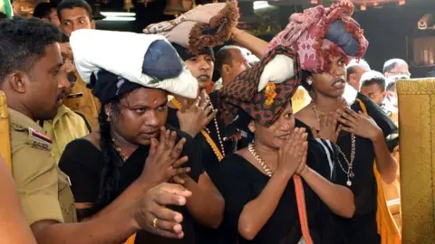 A S Satheesh The transgender women pray at the Sabarimala shrine in Kerala state