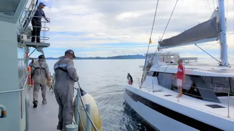 Photo supplied: FMSRCC Mr Wong rescued by the Fijian navy