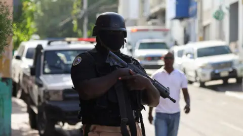 A police officer stands guard in Haiti's capital