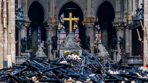 Reuters Debris piled up in the Nore-Dame