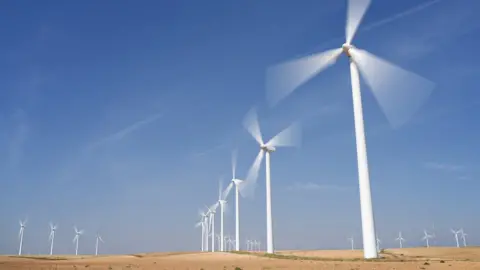 Getty Images Wind turbines