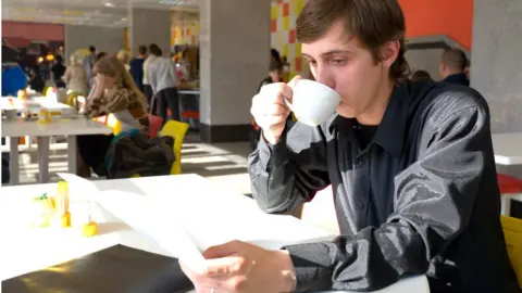 student eating breakfast