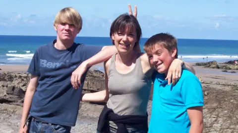 Daniel Spargo-Mabbs Foundation Jacob is wearing a navy top and jeans -his hair is long and blonde, Fiona is wearing a brown vest and has short brown hair and Daniel is wearing a blue top and has short brown hair