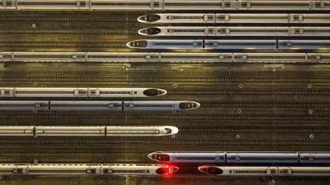 AFP via Getty Images Aerial view of bullet trains in China