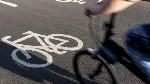 Getty Images Cycling travelling over a cycle lane at speed