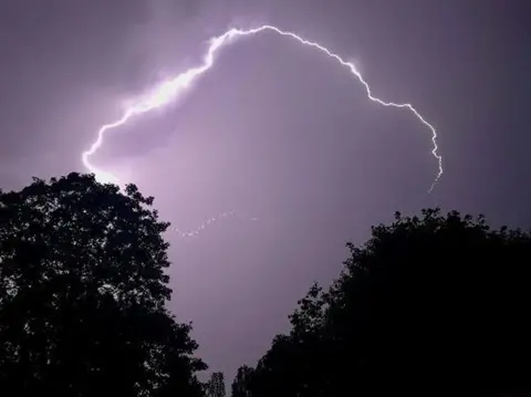 Peter Barrett /  Weather Watchers Lightning lights up the night sky in Hornchurch, Greater London