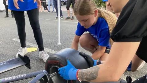 Girl with tyre