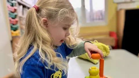 Vanessa Clarke/BBC Girl playing at Dingley's Promise