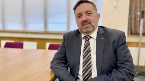 PA Media Robin Swann