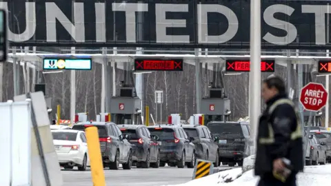 Cars cross the Canadian border