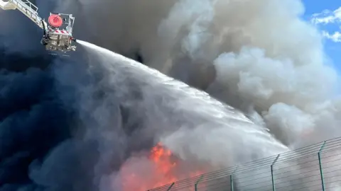 Suffolk firefighters tackling the fire at Sackers on Thursday