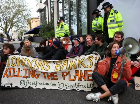 Reuters Climate activists at oil protest